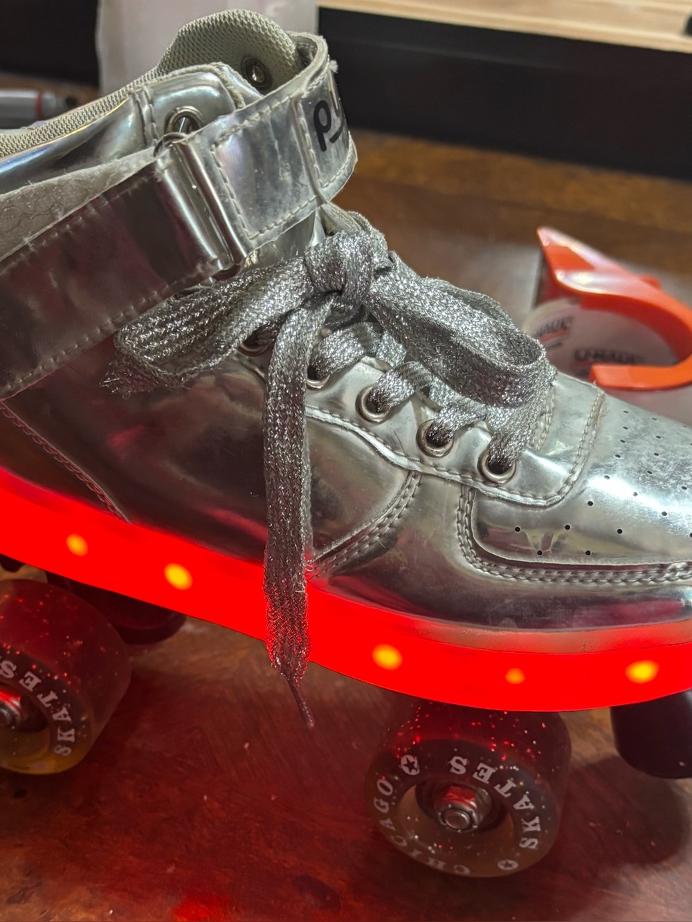 Chicago Skates unisex kids size 4.  Silver pulse light up skates.  Quad roller.